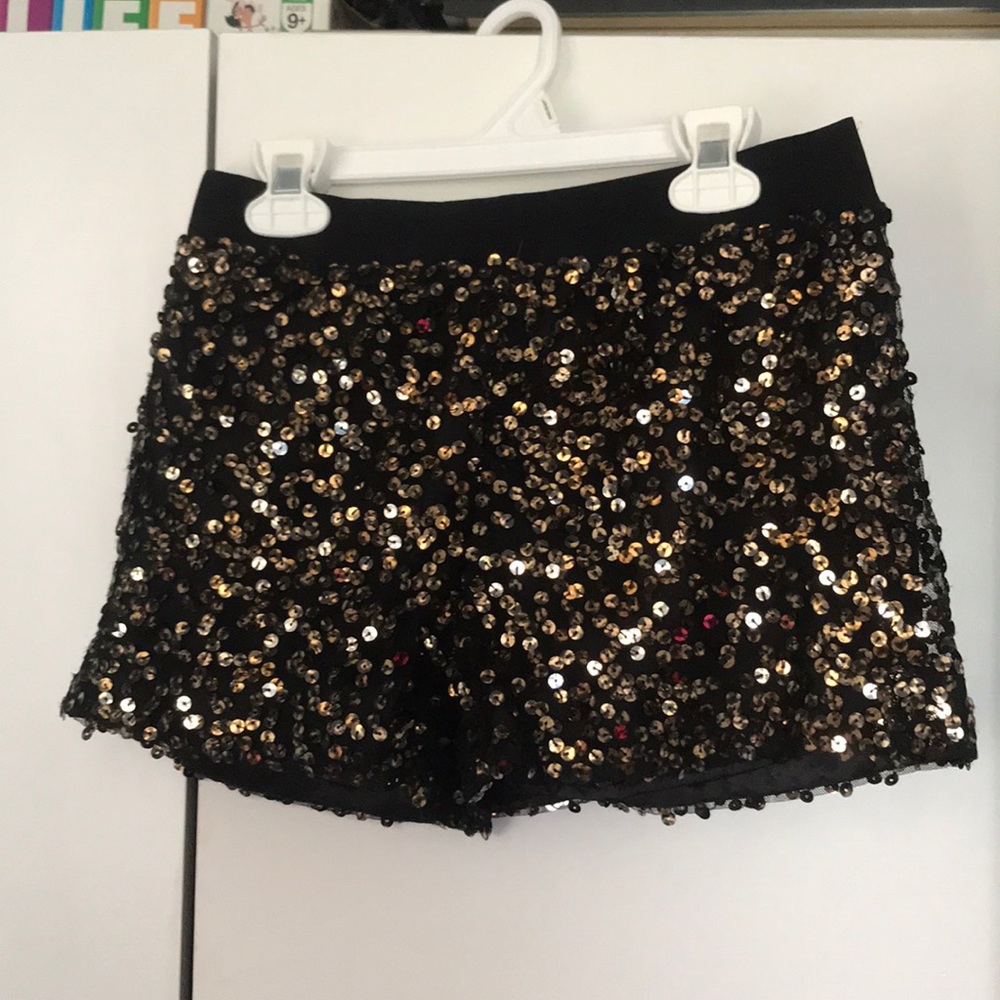 Gold and black sparkly shorts